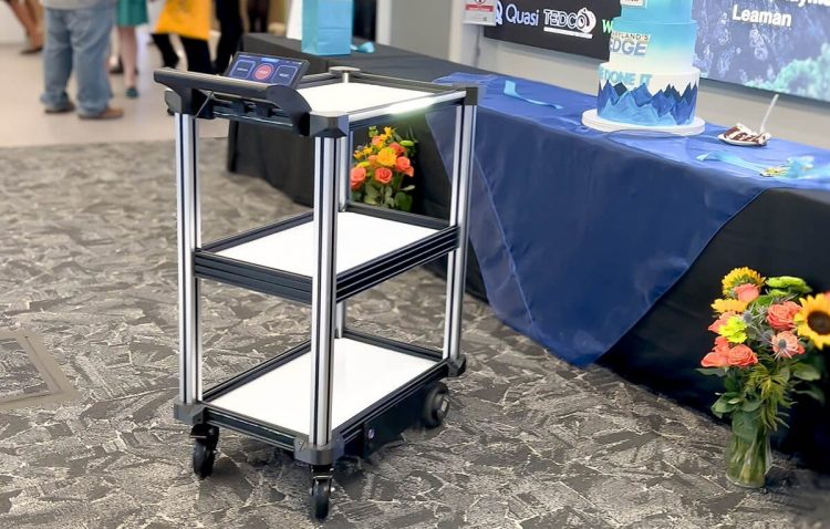 Quasi Robotic Cart serves drinks and transports empty cups and waste at the FITCI grand opening event